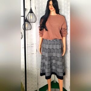 Black and White Houndstooth Skirt and a fancy sweater.